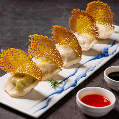 Китайские пельмени жареные в Soluxe Club по цене 1200 ₽