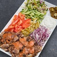 Шаверма из свинины на тарелке в Золотой шампур