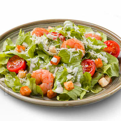 Салат Цезарь с креветками в РУ пицца по цене 600 ₽