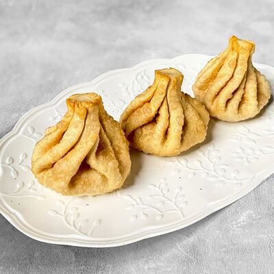 Жареные хинкали с говядиной в MaMa Mia по цене 241 ₽