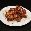 Куриные крылья в соусе кимчи M в Harats Pub по цене 1035