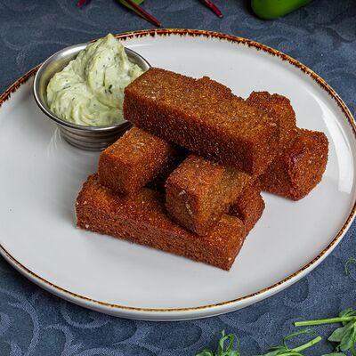 Гренки чесночные в Космос по цене 250 ₽