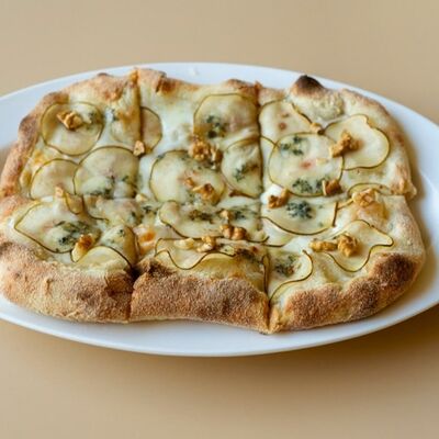 Пицца с грушей и горгонзолой в Romanico по цене 980 ₽