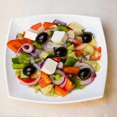 Салат Греческий в Цунами по цене 495 ₽