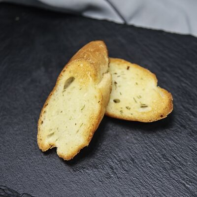 Гренки чесночныев Атлантида по цене 70 ₽