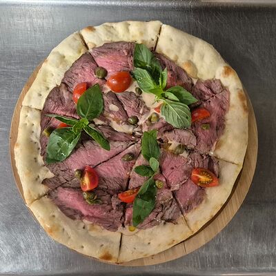 Пицца Вителло тоннато в Correas по цене 1390 ₽