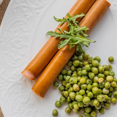 Сосиски фермерские с обжаренным зеленым горошком в Эрато по цене 590 ₽