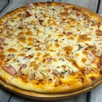 Пицца Ветчина-грибы в Магнат