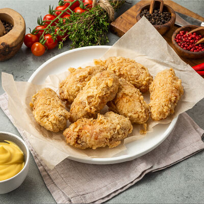 Крылья в панировкев Вкусный цыпленок по цене 489 ₽