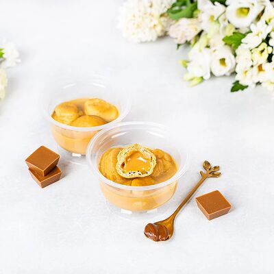 Профитроли с начинкой Крем-брюле в соусе с карамельным шоколадом в У Палыча. С пылу, с жару! по цене 431 ₽