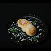 Сырники из рисовой муки со сгущёнкой в Yacht Cafe Sochi