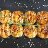 Запеченный ролл с морским гребешком в Renai sushi kitchen по цене 580