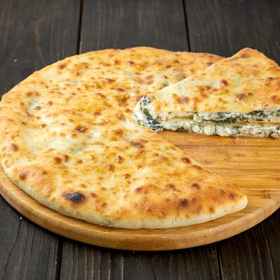 Осетинский пирог с сыром и зеленью в Осетинские пироги Вкусно Пироги по цене 1000
