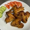 Куриные крылья на мангале в Берлога Кафе-бар по цене 135