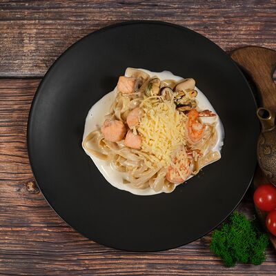 Феттуччине с морепродуктами в Японский городовой 64 по цене 420 ₽