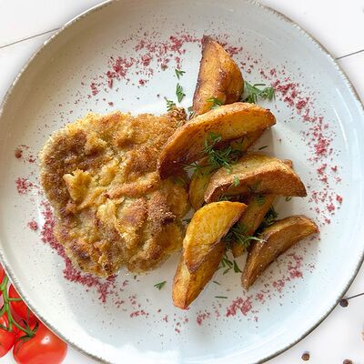 Шницель из свиной шеи в Пицца паста по цене 660 ₽