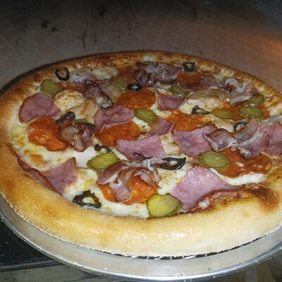 Пицца Мясная в Сытый мишка по цене 645 ₽