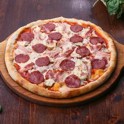Пицца Мясная в Panificio по цене 540 ₽
