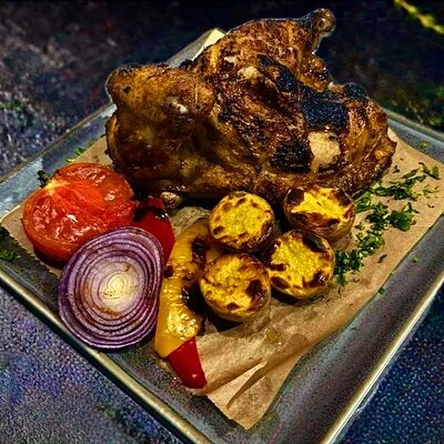 Цыпленок на огне с овощами в Мякоть по цене 1250 ₽
