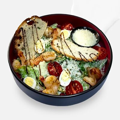 Цезарь с тигровыми креветками в Caviar по цене 860 ₽