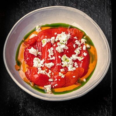 Запеченные перцы, фета и соус ромеско в Техникум по цене 620 ₽