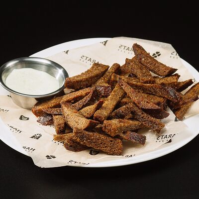 Ржаные корочки в Harats Pub по цене 207 ₽