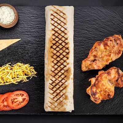 Шаурма сырная с курицей L в Shawarmahouse по цене 620 ₽