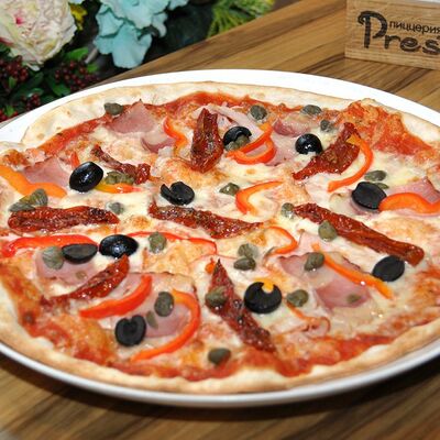 Пицца с ветчиной и каперсами в PrestoMia по цене 480 ₽
