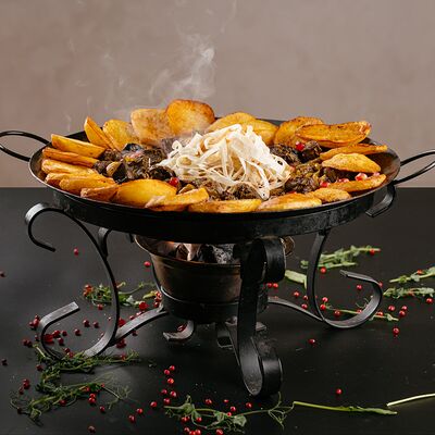 Садж-кебаб из свинины в Голд Сити по цене 1900 ₽