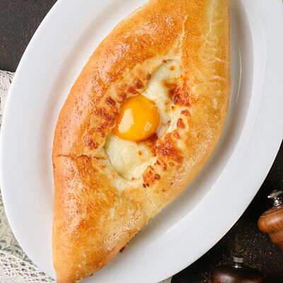 Хачапури по-аджарски в Мархал по цене 575 ₽