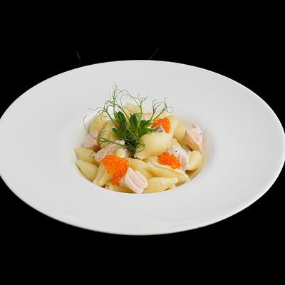 Конкильетте с семгой и красной икрой в Nest по цене 750 ₽