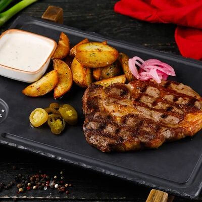 Стейк рибай с деревенским картофелемв Славянский базаръ по цене 4100 ₽