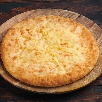 Пирог с картофелем и сыром в Шашлык и осетинские пироги по цене 850 ₽