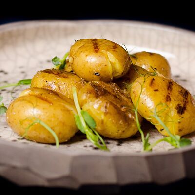 Картофель бейби в PlutuS Resto Club по цене 200 ₽