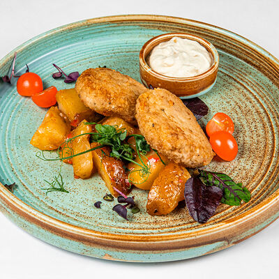 Рыбные котлеты с молодым картофелем и горчичным соусом в Фёст по цене 490 ₽