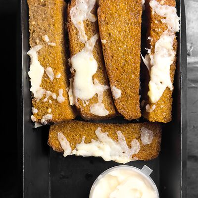 Фирменные гренки-крылья в Крылья по цене 340 ₽