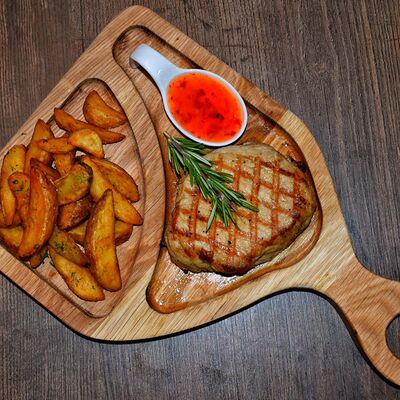 Стейк из cвинoй корейки с айдахо в Bareda по цене 590 ₽