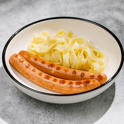 Спагетти с сосисками в Гости по цене 380 ₽