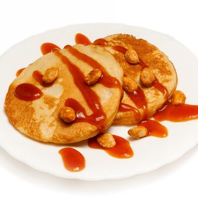 Панкейки с карамелизированным арахисом и соленой карамелью в Абсолют по цене 200 ₽