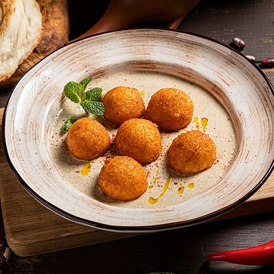 Сырные шарики с соусом баже в PRO.Хинкали by Novikov по цене 540 ₽