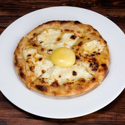 Фирменная лепешка Колесо в Трактир Колесо по цене 566 ₽