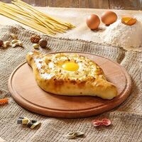 Хачапури по-аджарски в Кафе Динамо грузинская кухня