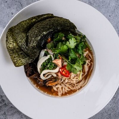 Рамен с морепродуктами в Мидийное место по цене 770 ₽