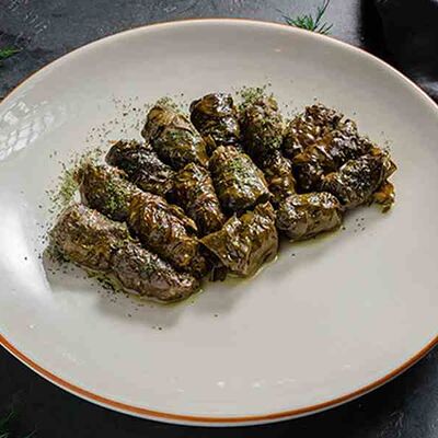 Долма из винoградных листьев в Тбилисимо по цене 675 ₽