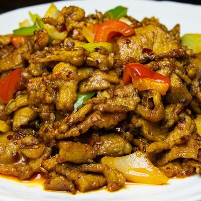 Пряная свинина с овощами в Шангрила по цене 1120 ₽