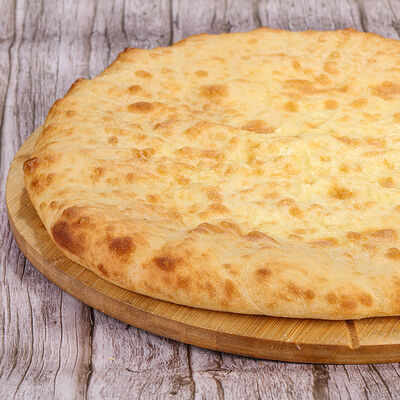 Осетинский пирог с сыром и зеленью в Пекарня Колос по цене 1220 ₽