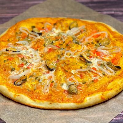 Пицца с кальмаром и мидиями в Хочу-Могу по цене 480 ₽