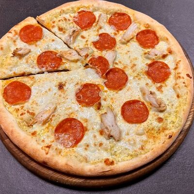 Салями курица в Пицца Токо Суши по цене 657 ₽