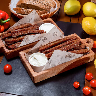 Чесночные гренки к пиву в Золотая прага по цене 325 ₽