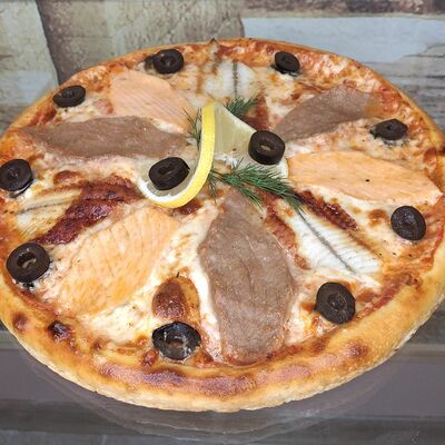 Пицца Рыбная в Pizza mizza по цене 697 ₽